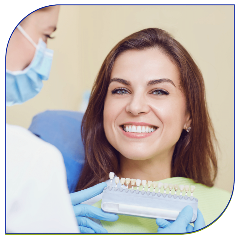 Dentist showing Dental Crowns Orange County to a patient.